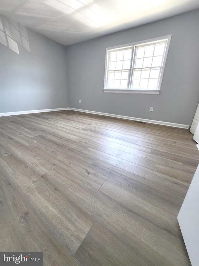 119 Hickok Cir, Fredericksburg, VA 22401 - spare room featuring baseboards and wood finished floors