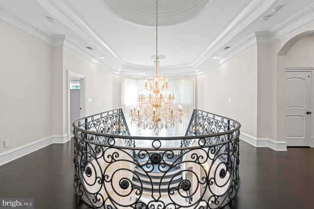 696 Miller Ave, Great Falls, VA 22066 - corridor with arched walkways, a raised ceiling, an upstairs landing, and a chandelier