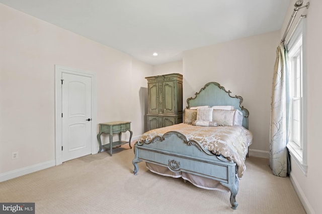696 Miller Ave, Great Falls, VA 22066 - bedroom featuring light colored carpet, baseboards, and multiple windows