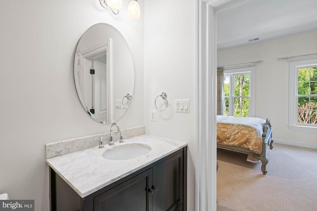 696 Miller Ave, Great Falls, VA 22066 - ensuite bathroom featuring vanity, connected bathroom, and visible vents