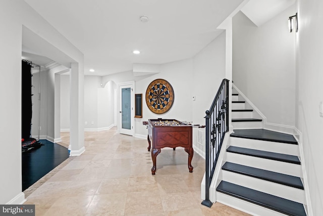 696 Miller Ave, Great Falls, VA 22066 - stairs featuring arched walkways, baseboards, and recessed lighting