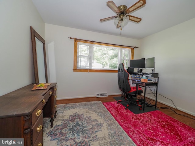 1235 Lorene Dr, Pasadena, MD 21122 - office space featuring a ceiling fan, wood finished floors, and baseboards