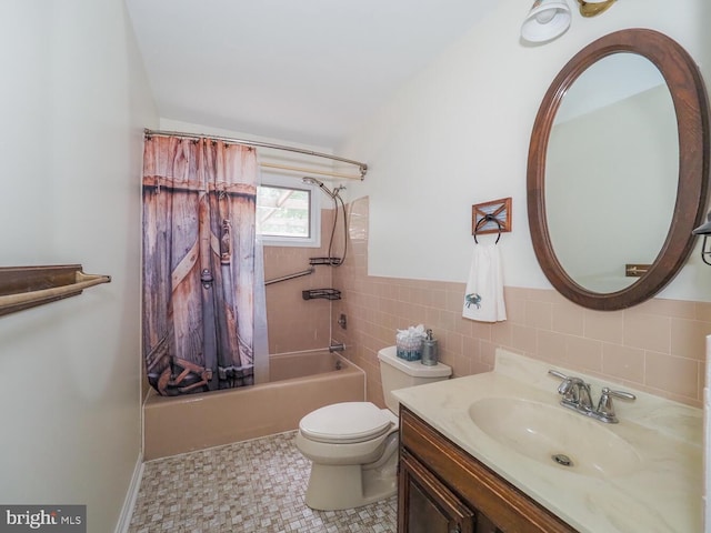 1235 Lorene Dr, Pasadena, MD 21122 - full bathroom featuring shower / bathtub combination with curtain, vanity, toilet, and tile walls