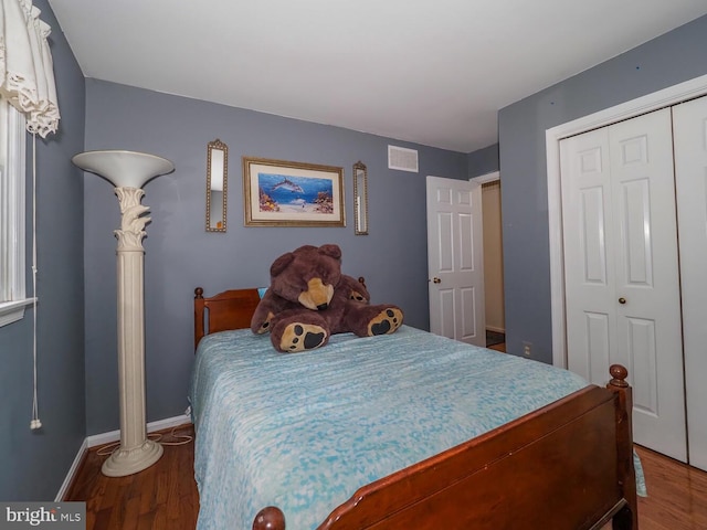 1235 Lorene Dr, Pasadena, MD 21122 - bedroom with wood finished floors, a closet, and baseboards