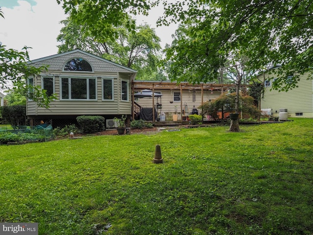 1235 Lorene Dr, Pasadena, MD 21122 - rear view of house with a yard
