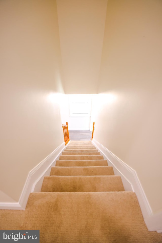 stairway with baseboards