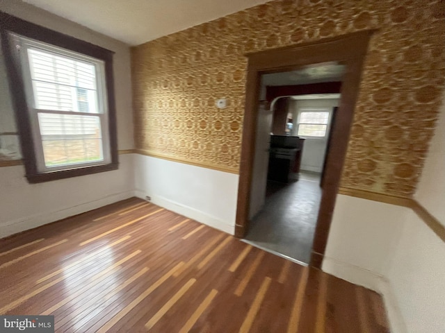 3314 Egerton Rd, Baltimore, MD 21215 - spare room with a wainscoted wall and wood finished floors