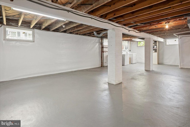 basement featuring separate washer and dryer