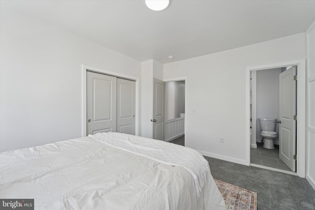 25 N Brown St, Gloucester City, NJ 08030 - bedroom with dark carpet, baseboards, a closet, and connected bathroom