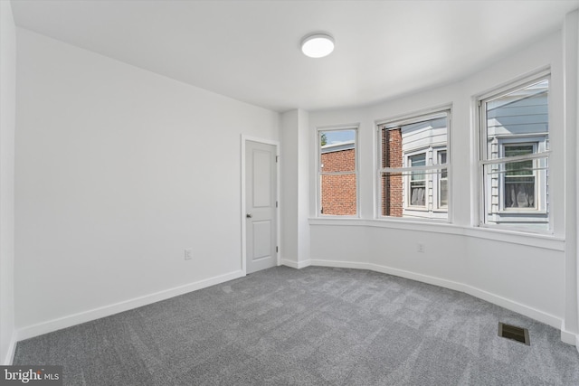 25 N Brown St, Gloucester City, NJ 08030 - carpeted empty room featuring baseboards