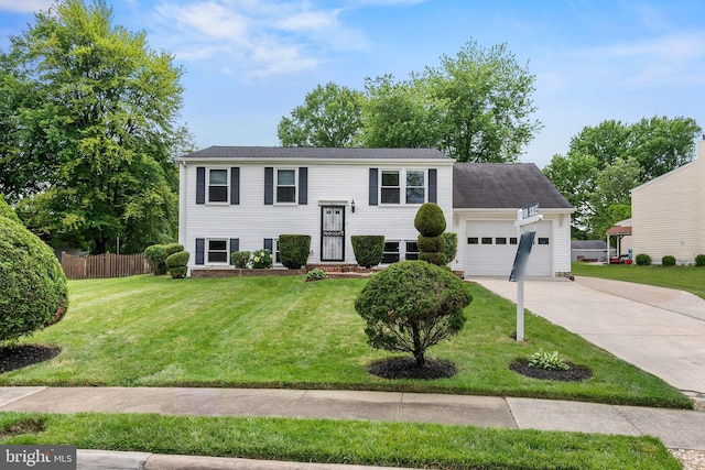 1263 Wilshire Dr, Herndon, VA 20170 - bi-level home with an attached garage and driveway