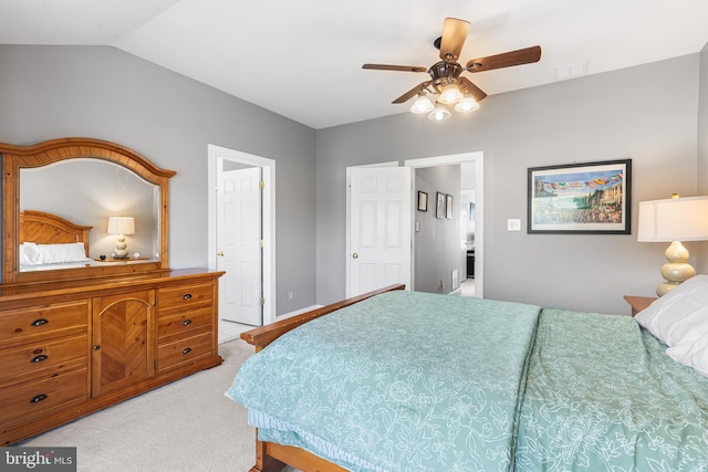 bedroom with light carpet, lofted ceiling, and ceiling fan