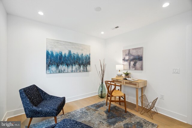 office with visible vents, recessed lighting, baseboards, and wood finished floors