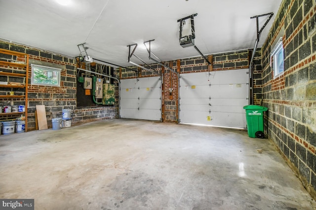 6911 Wells Pkwy, University Park, MD 20782 - garage featuring a garage door opener