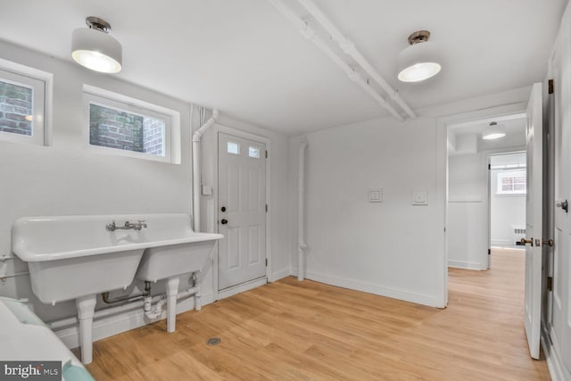 6911 Wells Pkwy, University Park, MD 20782 - entrance foyer with light wood-type flooring and baseboards