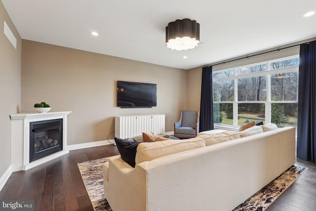 6 Skydance Way, West Chester, PA 19382 - living room with recessed lighting, dark wood-type flooring, baseboards, and a glass covered fireplace