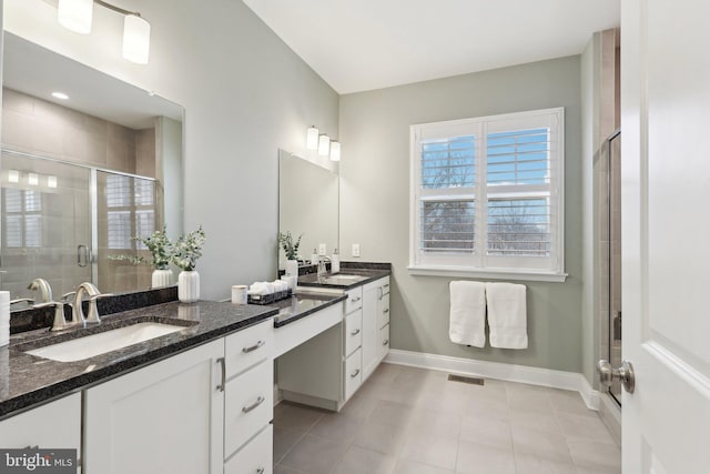 6 Skydance Way, West Chester, PA 19382 - bathroom with double vanity, tile patterned flooring, a stall shower, and a sink