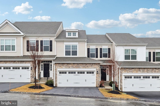 6 Skydance Way, West Chester, PA 19382 - view of property featuring stone siding, a shingled roof, driveway, and a garage