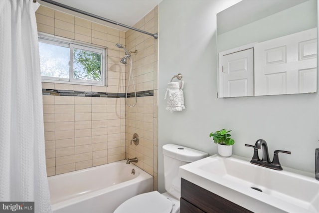 bathroom featuring vanity, toilet, and shower / tub combo