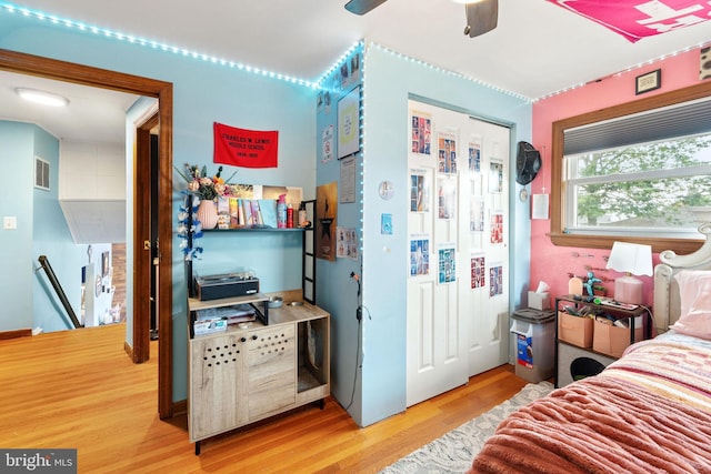 bedroom with wood finished floors and ceiling fan