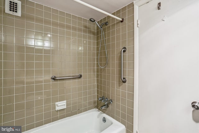 bathroom with shower / washtub combination