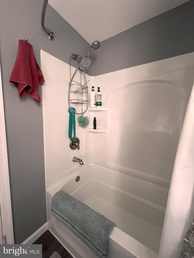 full bath featuring shower / bathtub combination
