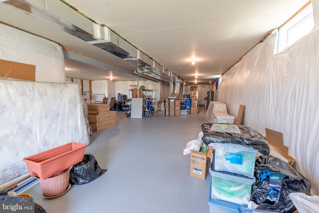 below grade area featuring water heater