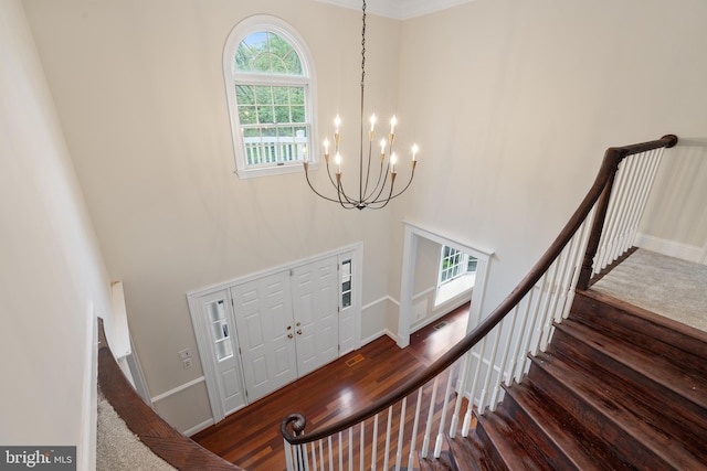 1625 Stonington Cir, North Wales, PA 19454 - entryway featuring a high ceiling, a chandelier, stairs, baseboards, and wood finished floors