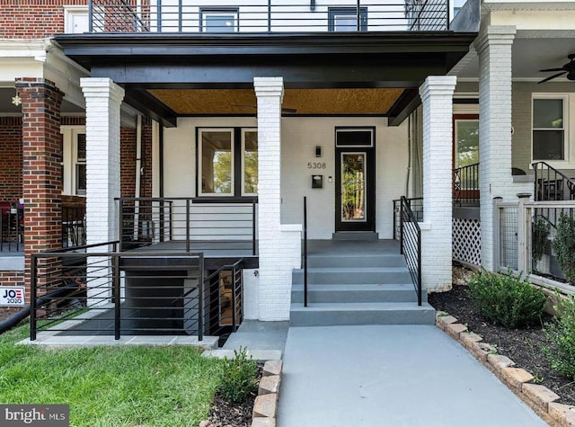 5308 5th NW, Washington, DC 20011 - entrance to property with brick siding, a balcony, a porch, and a ceiling fan