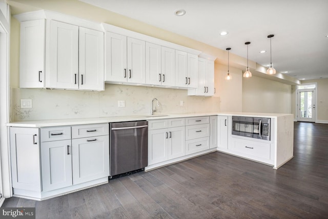 5308 5th NW, Washington, DC 20011 - kitchen featuring stainless steel appliances, a peninsula, dark wood-style floors, recessed lighting, and light countertops