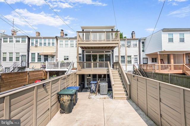5308 5th NW, Washington, DC 20011 - back of property with stairway, a fenced backyard, and a patio area