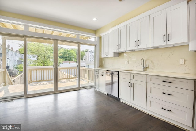 5308 5th NW, Washington, DC 20011 - kitchen featuring dishwasher, dark wood-style floors, decorative backsplash, recessed lighting, and white cabinetry