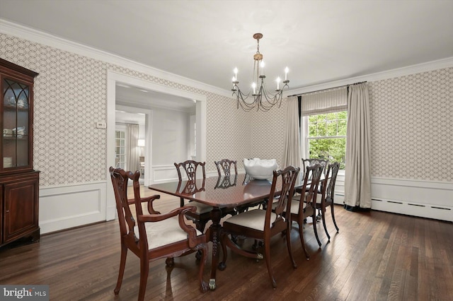 2720 35th Pl NW, Washington, DC 20007 - dining space with wallpapered walls, a chandelier, dark wood-style floors, ornamental molding, and wainscoting