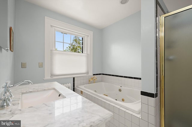 2720 35th Pl NW, Washington, DC 20007 - bathroom featuring a sink, a stall shower, and a tub with jets