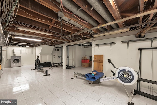 2720 35th Pl NW, Washington, DC 20007 - exercise area featuring washer / dryer and tile patterned flooring