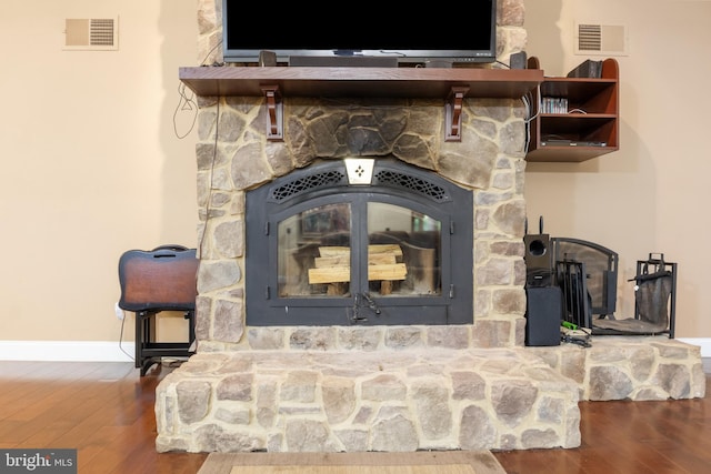 1982 Whyte Ln, Spring Grove, PA 17362 - detailed view of wood finished floors, a stone fireplace, and baseboards
