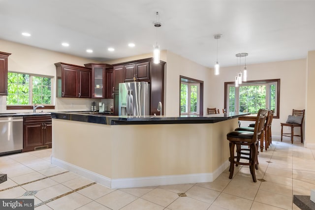 1982 Whyte Ln, Spring Grove, PA 17362 - kitchen featuring stainless steel appliances, plenty of natural light, recessed lighting, and light tile patterned flooring