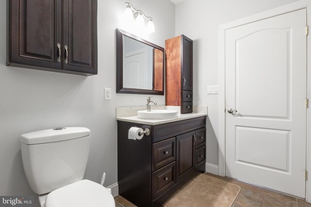 1982 Whyte Ln, Spring Grove, PA 17362 - bathroom with vanity, toilet, and baseboards