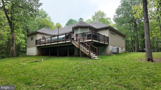 1982 Whyte Ln, Spring Grove, PA 17362 - back of house featuring a wooden deck, stairway, and a yard