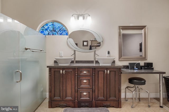 1982 Whyte Ln, Spring Grove, PA 17362 - full bath featuring a stall shower, tile patterned flooring, double vanity, and baseboards