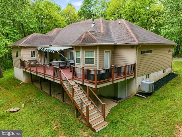 1982 Whyte Ln, Spring Grove, PA 17362 - back of house featuring a deck, cooling unit, a yard, a shingled roof, and stairs