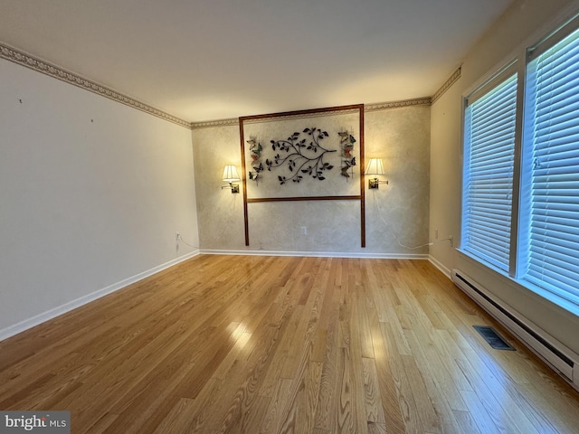 359 Towpath Ln, Pine Grove, PA 17963 - spare room featuring baseboards, a baseboard radiator, and light wood finished floors
