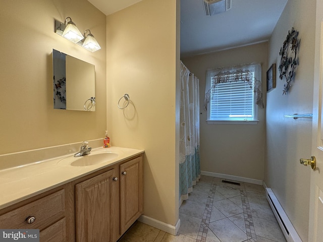 359 Towpath Ln, Pine Grove, PA 17963 - full bathroom with tile patterned floors, a baseboard heating unit, baseboards, and visible vents