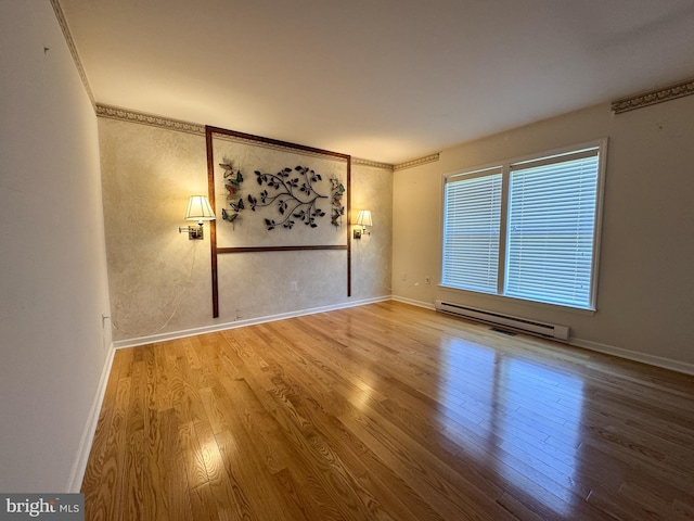 359 Towpath Ln, Pine Grove, PA 17963 - unfurnished room featuring baseboards, wood finished floors, and baseboard heating