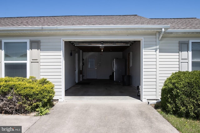 359 Towpath Ln, Pine Grove, PA 17963 - garage with freestanding refrigerator and driveway