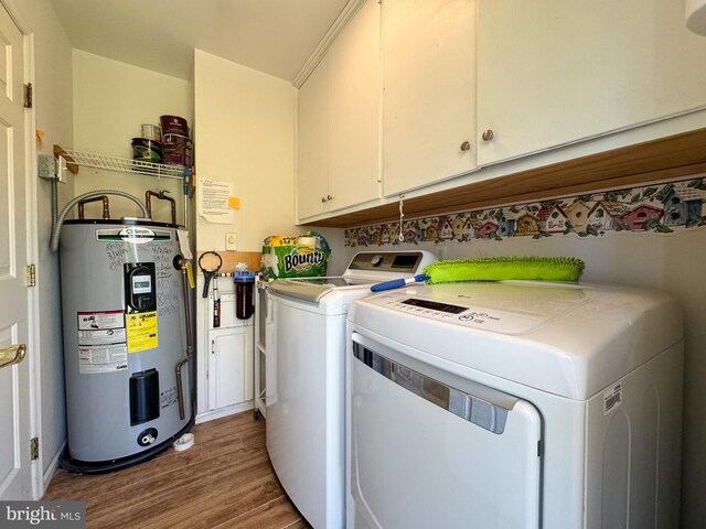 359 Towpath Ln, Pine Grove, PA 17963 - washroom with cabinet space, wood finished floors, washer and dryer, and electric water heater