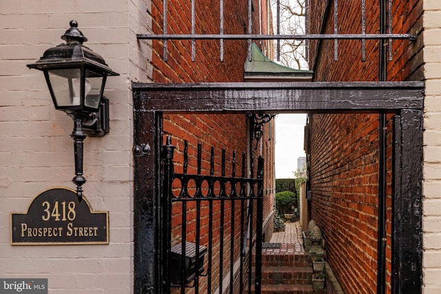 view of exterior entry with a gate