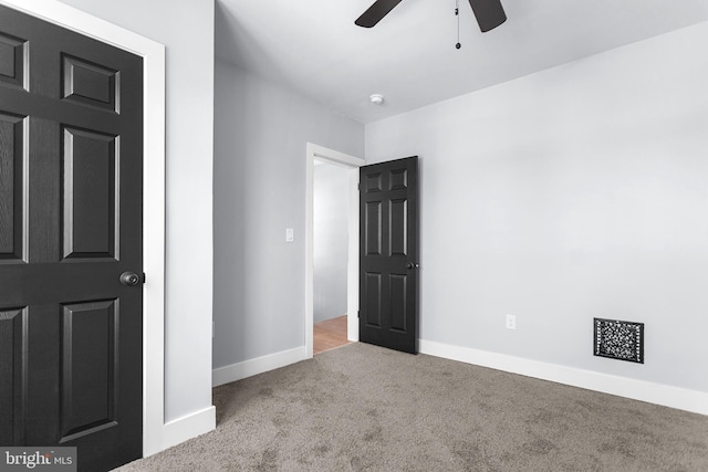 54 Cedar St, Marcus Hook, PA 19061 - unfurnished bedroom featuring baseboards, ceiling fan, and carpet