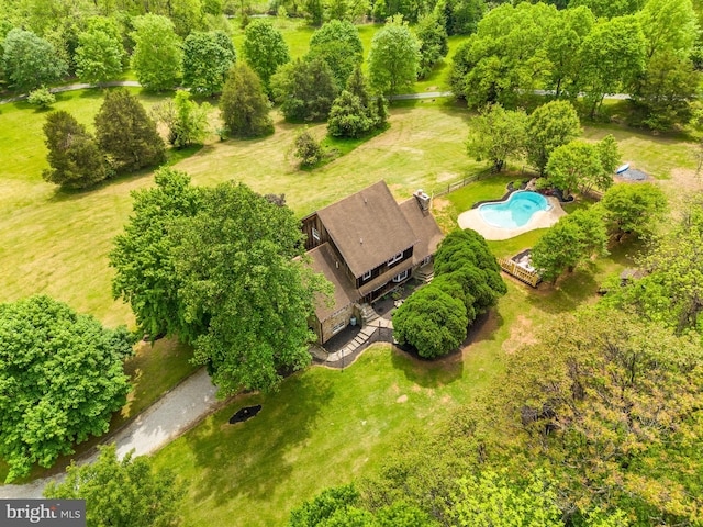 drone / aerial view of a pool
