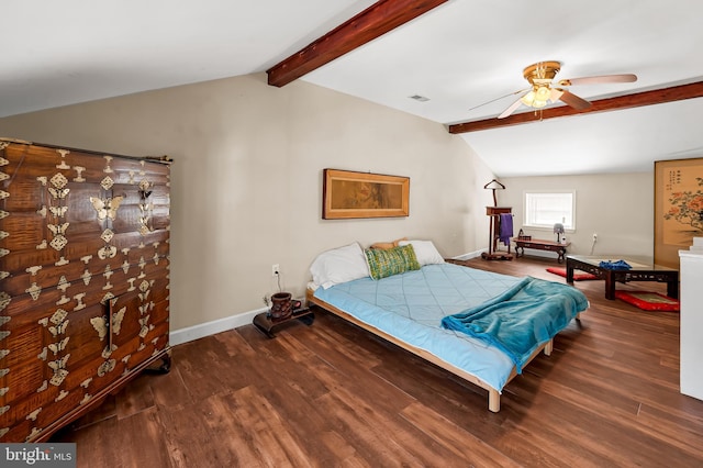 bedroom featuring ceiling fan, baseboards, lofted ceiling with beams, and wood finished floors